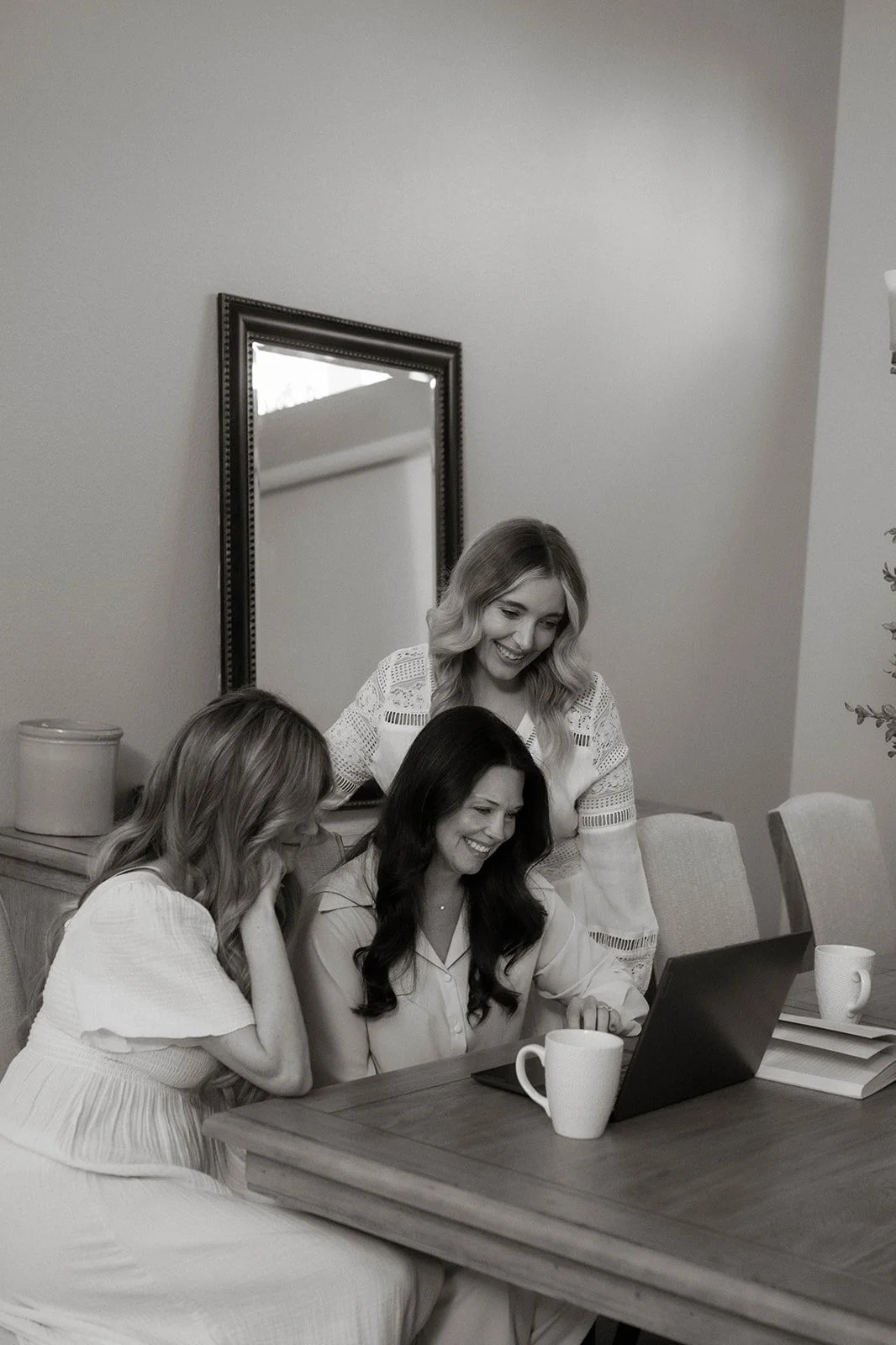 Three women with laptop